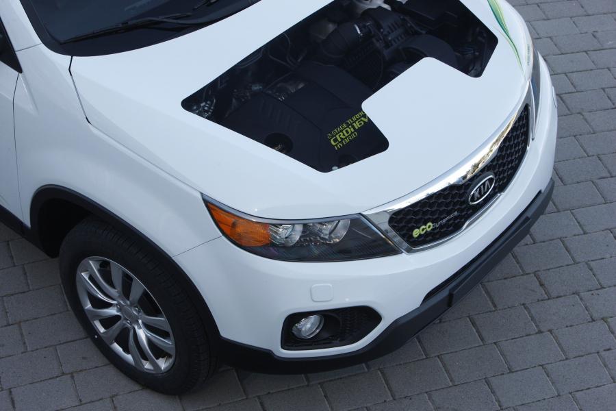  Kia Sorento Hybrid 2010 года  (фото 21 из 31)